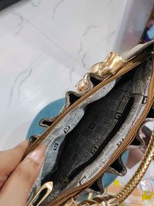 Elegant Silver Embellished Clutch