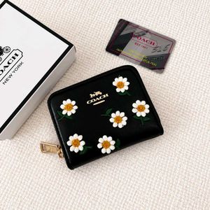 Coach(COPY)mini embroidered daisy flowers
