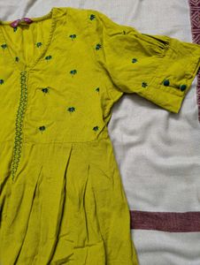 Elegant embroided lime yellow peplum top
