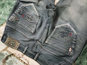 Distressed Blue Denim Jeans