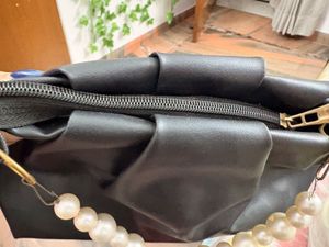 Chic Black Clutch with Pearl Handle
