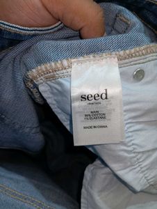 Seed Light Wash Distressed Hem Jeans