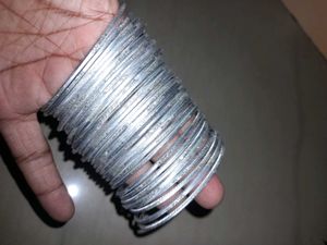 Silver shiny metal bangles set
