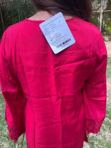 Beautiful Red Coords Set with price tag.