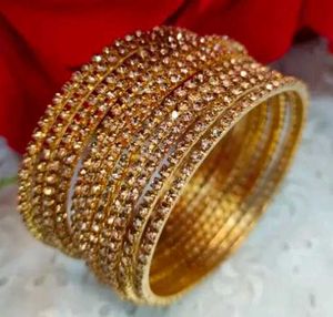 Set Of 12 Golden Bangles with Stone Detail