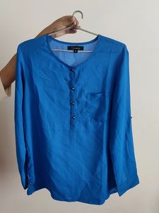 New Blue Top In Good Condition