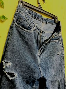 Distressed Blue Denim Jeans