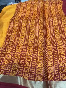Vibrant Orange Saree with Maroon Border