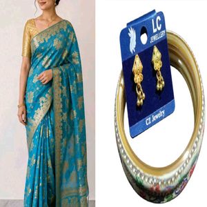 Blue Saree with bangles and earrings