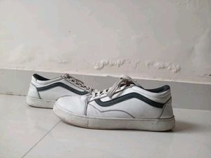 White Sneakers with Black Stripe