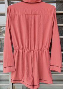 Chic Pink Romper with Black Trim