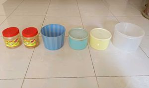 Six Assorted Plastic Containers