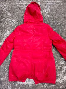 Vibrant Red Puffer Jacket with a Hoodie