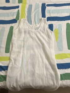 White Sleeveless Kurta with Red Buttons