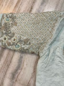 Elegant Mint Green Embellished Lehenga Choli
