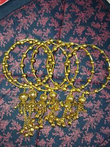 Set of Traditional Gold Bangles with Charms