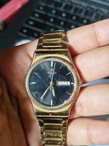 Titan Gold Analog Watch