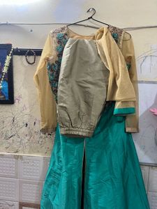 Elegant Teal Kurta Set with Embellished Top