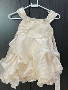 Elegant Cream Ruffled frock