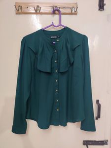 bottle green full sleeve frilled top.