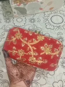 Red clutch unused