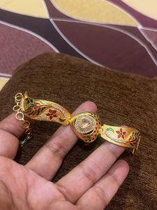 Elegant Gold Bracelet with Stones