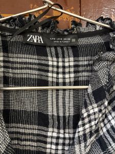 Chic Plaid Mini Dress with Black Trim