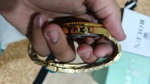 Luxury Gold &amp; Green Rolex Watch