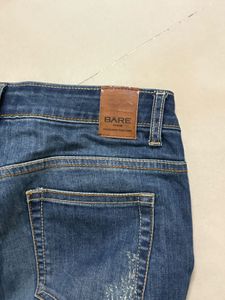 Women's Ripped Blue Jeans