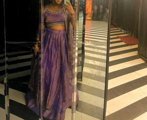 Tissue Lehenga with stiched blouse
