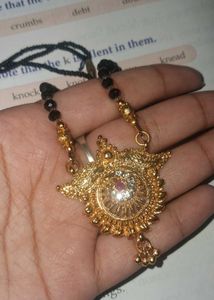 Mangalsutra. Exquisite Gold Necklace with Red Ston