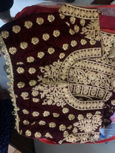 Exquisite Maroon Velvet Lehenga with Golden Embroi