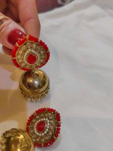 Elegant Jhumka Earrings with Red Stones