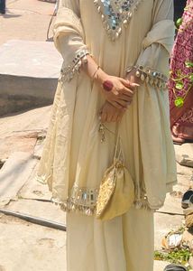 cowrie shells and mirror work kurta set