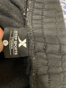 Xtep Black Joggers with White Stripes