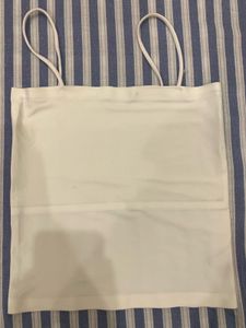 white sleeveless tank top