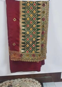 Elegant Maroon Saree with Embellishments