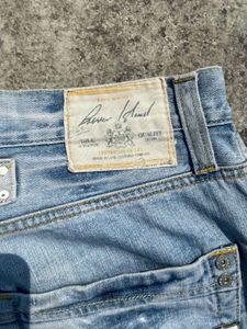 Distressed Light Wash Flare Jeans