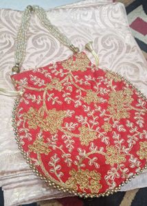 Elegant Cream Jacquard  Saree with potli  purse