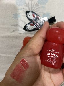 combo of two gloss and hello kitty makeup c