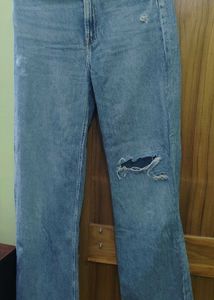Ripped Blue Denim Jeans