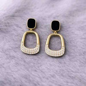 Elegant Gold &amp; Black Drop Earrings