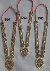 Fancy Pooja Articles. Haar For God Idols.