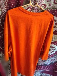 Orange "Stay Groovy" Graphic Tee
