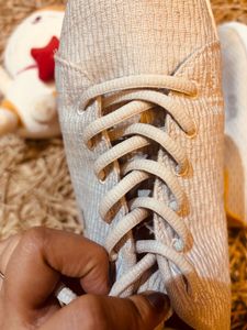 Stylish Grey Sneakers with Gold Accent