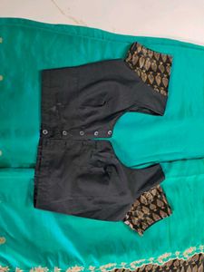 Beautiful Teal Saree with Embroidered Border