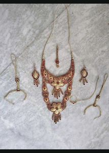 16.Stunning Red and Gold Bridal Jewellery Set