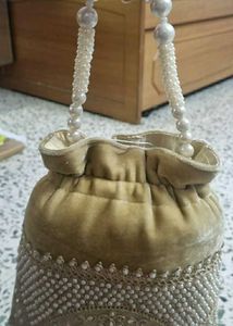 Elegant Pearl Embellished Drawstring Potli Bag