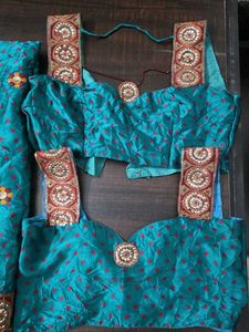 Teal Saree with 2 sleevless Blouse