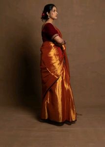 Graceful Tissue Saree – Lightweight, Glossy